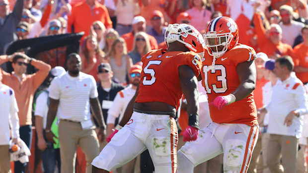 K.J. Henry and Tyler Davis celebrate sack